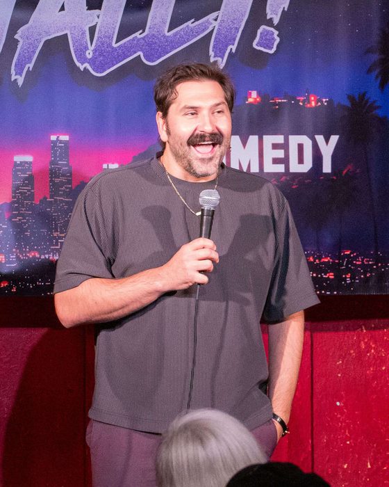 Comedian on stage at Totally! Comedy Show at Bar Lubitsch