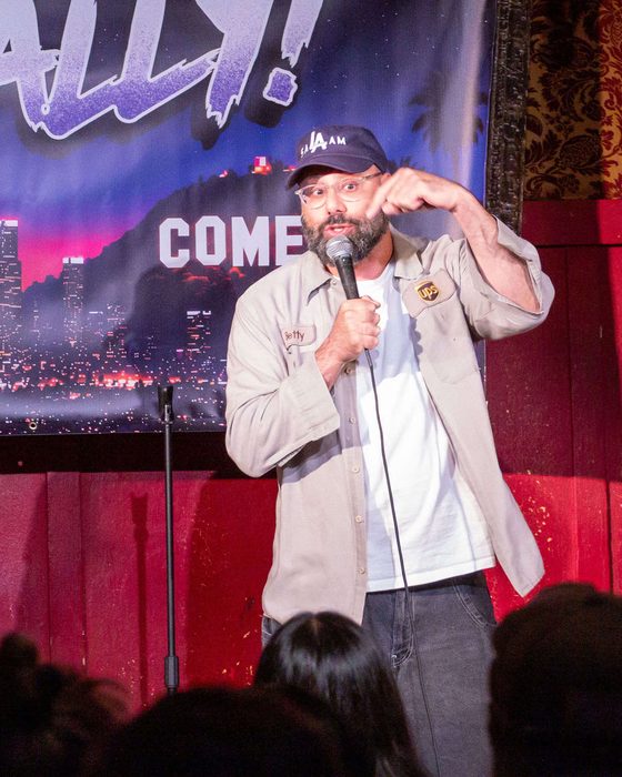 Comedian on stage at Totally! Comedy Show at Bar Lubitsch