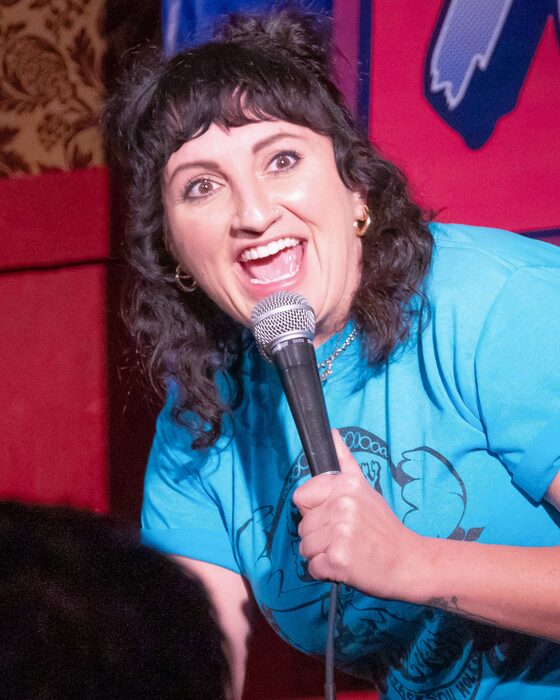 Comedian on stage at Totally! Comedy Show at Bar Lubitsch