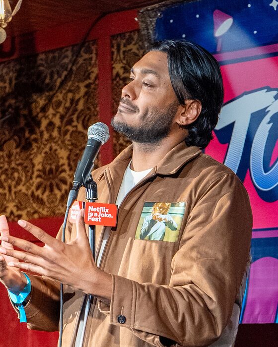 Comedian on stage at Totally! Comedy Show at Bar Lubitsch